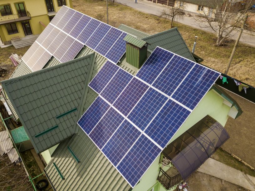 Off grid solar home with rooftop installation highlighting solar panel size and dimensions for maximum energy efficiency