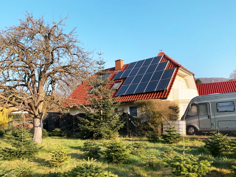 Residential on-grid solar panels connected to the utility grid for reliable electricity supply