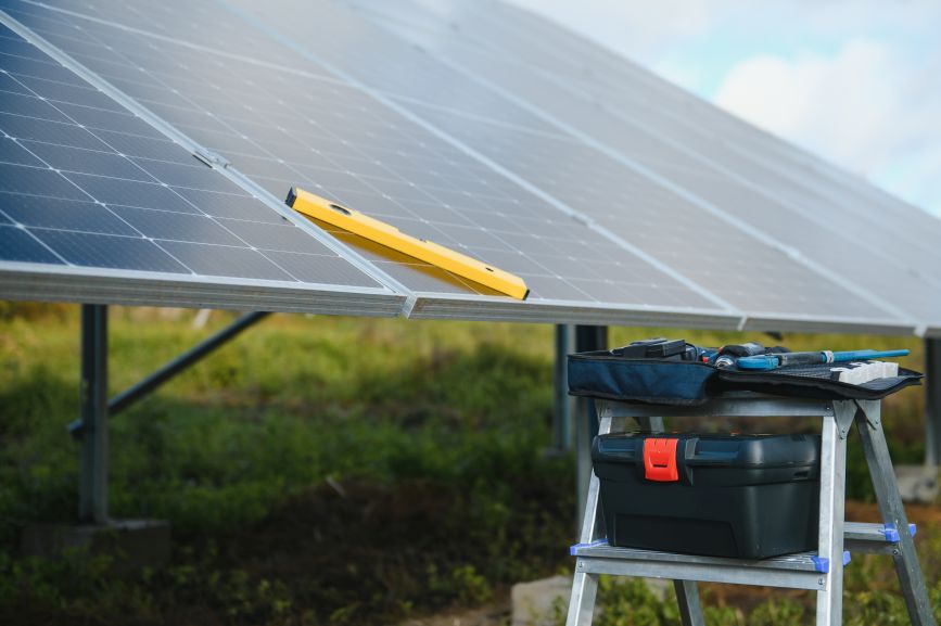 Solar panel installation with maintenance tools on site