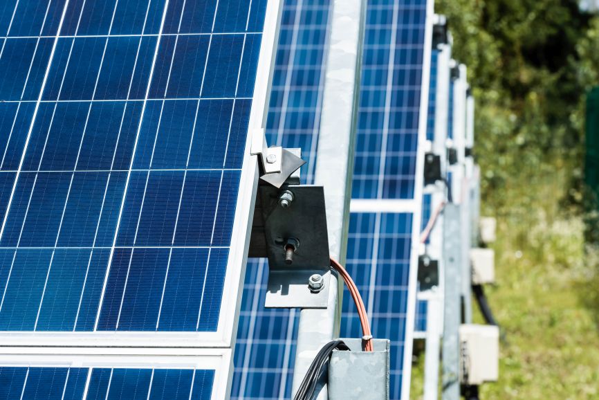 Close-up of automated solar panels installed by EcoSunWorks for efficient energy tracking